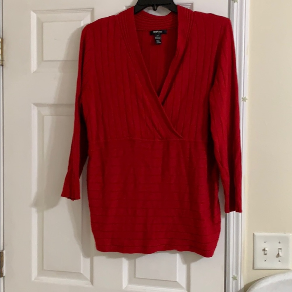 Red blouse.